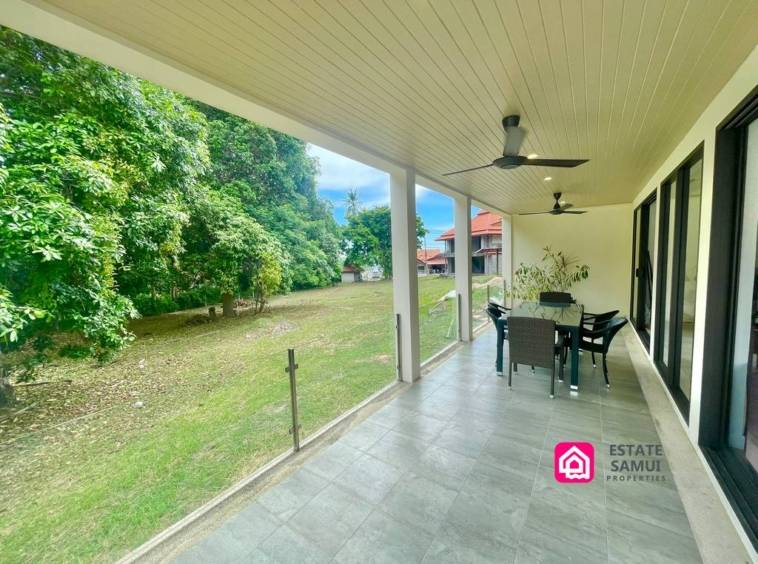 balcony overlooking a garden area